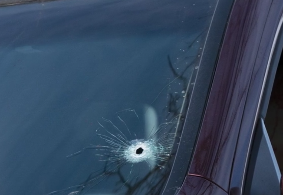 Bullet hole in the windshield of Renee Nicole Good's car.